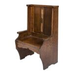 AN UNUSUAL ART NOUVEAU HALL BENCH, 
with double panel high back, with a central copper plate,