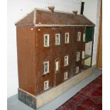 A LARGE SIX BAY PAINTED WOODEN DOLL'S HOUSE, 
probably c.