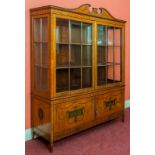 A FINE ADAMS STYLE EDWARDIAN SATINWOOD DISPLAY CABINET, 
with swan neck pediment,