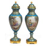 A VERY GOOD PAIR OF SERVES STYLE CELESTE BLUE FRENCH PORCELAIN VASES AND COVERS,