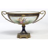 A FRENCH PORCELAIN AND BRASS MOUNTED BOAT SHAPED COMPORT,