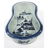 A 19TH CENTURY CHINESE BLUE AND WHITE PORCELAIN BIDET,