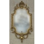 A 19TH CENTURY GILT AND GESSO PIER MIRROR, 
with pierced shell crest, issuing leaf sprays,