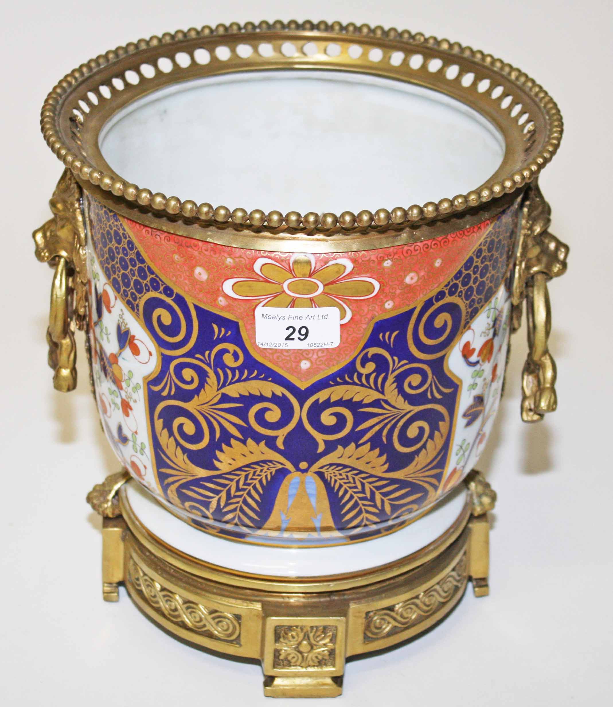 AN ATTRACTIVE IMARI STYLE GILT BRASS AND PORCELAIN JARDINIERE, with pierced and bead moulded top,