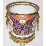 AN ATTRACTIVE IMARI STYLE GILT BRASS AND PORCELAIN JARDINIERE, with pierced and bead moulded top,