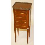 A FRENCH WALNUT AND BRASS MOUNTED PETITE COMMODE, 
with three quarter pierced gallery,