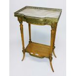 AN ATTRACTIVE FRENCH MAPLE AND BRASS MOUNTED ETAGERE,