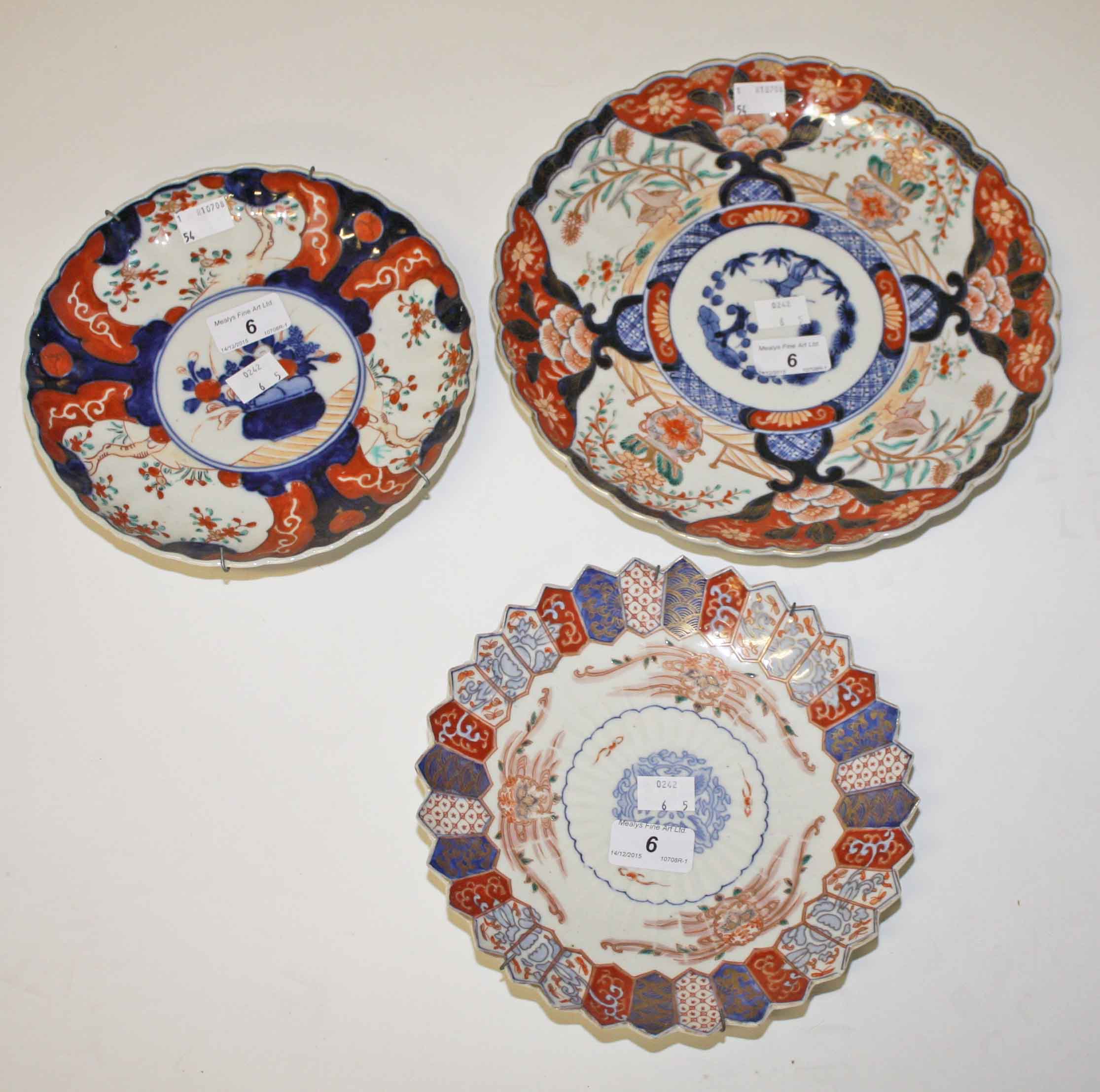 A JAPANESE IMARI DISH, 
decorated with flowers and birds,