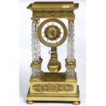 A FINE FRENCH GILT BRASS AND CUTGLASS PORTICO MANTEL CLOCK, indistinctly stamped #ECHOT,