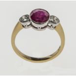 A VERY NICE THREE STONE DIAMOND AND RUBY RING, 
the larger oval ruby 2.