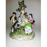 A GERMAN PORCELAIN GROUP, 
modelled with pony and family, each figure in elegant attire,