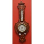 A BANJO SHAPED INLAID ANEROID BAROMETER, 
with thermometer, 27.5in (70cm)h x 10in (25cm).
