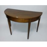 A 19TH CENTURY MAHOGANY DEMI LUNE SIDE TABLE, 
with plain frieze,