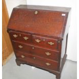 AN 18TH CENTURY SLOPE FRONT BUREAU, 
the interior fitted with drawers and pigeon hole compartments,