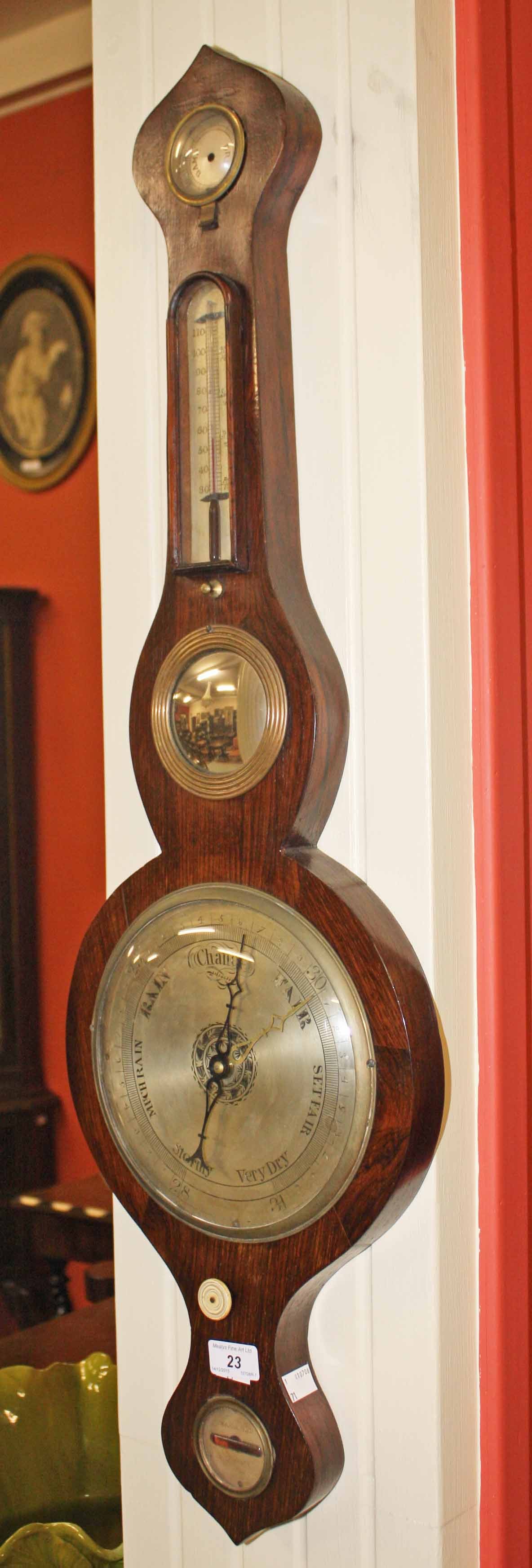 A ROSEWOOD WHEEL BAROMETER 
19th century, with five dials including a convex mirror, 36in (92cm).