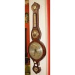 A ROSEWOOD WHEEL BAROMETER 
19th century, with five dials including a convex mirror, 36in (92cm).