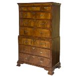 AN EIGHTEENTH CENTURY WALNUT AND CROSSBANDED CHEST ON CHEST,