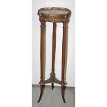 A FRENCH BRASS MOUNTED MARBLE TOP JARDINIERE STAND, with pierced gallery and fluted supports,