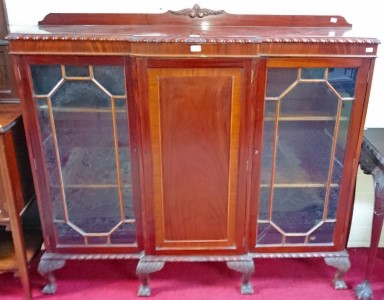 A BREAKFRONT MAHOGANY DISPLAY CABINET, 
with gadroon edge,