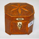 AN OCTAGONAL POKER-WORK TEA CADDY, 
with ivory mounts, 20th century 5in (13cm).