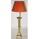 A PAIR OF ATTRACTIVE BRASS STANDARD LAMPS,