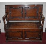 A MAHOGANY MONKS BENCH/TABLE, 
in the 17th century style,