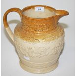 A LARGE TWO TONE RELIEF MOULDED STONEWARE CIDER JUG, 
late 19th century, 10in (26cm).