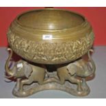 A LARGE INDIAN BRASS BOWL, 
chased with figures amongst foliage,