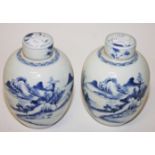 A PAIR OF CHINESE PORCELAIN BLUE AND WHITE JARS AND COVERS,