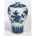 A CHINESE BLUE AND WHITE MEIPING VASE, 
decorated with flowers and fruit, 13.5in (34cm).