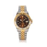 ROLEX OYSTER PERPETUAL GMT-MASTER REF. 16753 DEL 1979 CA.  C. stainless steel and 18K yellow gold,