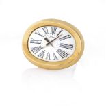 CARTIER LONDON SVEGLIA FINE ANNI '60.  C. oval-shaped gilt brass with 9K gold front. D. white with