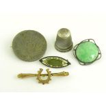 A GREEN GLAZED POTTERY SET SILVER BROOCH, POSSIBLY RUSKIN, MARKED STERLING, A PRUSSIAN SILVER COIN