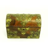 A VICTORIAN BRASS MOUNTED AND FIGURED WALNUT TEA CADDY WITH COFFERED LID