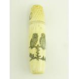 A BONE SHUTTLE SHAPED BODKIN CASE, THE COVER IN THE FORM OF A THIMBLE, FINELY DECORATED IN PENWORK