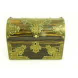 A VICTORIAN MARBLE WOOD TEA CADDY MOUNTED WITH PIERCED AND ENGRAVED BRASS STRAPWORK TO THE SIDES AND