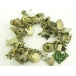 A SILVER CHARM BRACELET, 111G