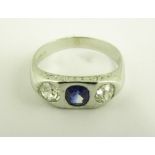 A SAPPHIRE AND DIAMOND THREE STONE RING, IN 18CT WHITE GOLD, LONDON 2009, 5.1G