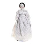 A GERMAN GLAZED PORCELAIN SHOULDER HEADED DOLL the head with moulded black hair, painted light