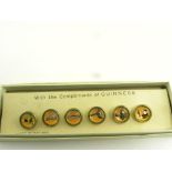 BREWERIANNA. A SET OF SIX GUINNESS ADVERTISING BUTTONS ON ORIGINAL SHOWCARD, BOXED, PROBABLY 1930S