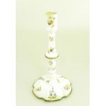 A GEORGE III SOUTH STAFFORDSHIRE ENAMEL CANDLESTICK, PAINTED WITH FLOWERS AND SPRAYS, C1770