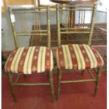 A PAIR OF VICTORIAN PAINTED FAUX BAMBOO CHAIRS