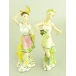 A PAIR OF WEDGWOOD EARTHENWARE FIGURES OF YOUNG WOMEN EMBLEMATIC OF SPRING AND SUMMER FROM A SET