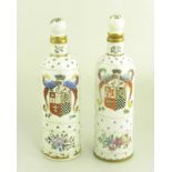 A PAIR OF CONTINENTAL PORCELAIN PSEUDO ARMORIAL FLASKS AND STOPPERS, EARLY 20TH C