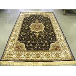 A LUSTROUS WOOL BLUE GROUND MEDALLION RUG