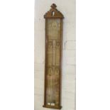 A VICTORIAN OAK FITZROY BAROMETER WITH PRINTED GOTHIC LABEL AND LOZENGE SHAPED REGISTRATION MARK