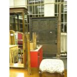 A CARVED OAK FOUR POST BED, ELEMENTS 18TH C WITH CARVED AND PANELLED HEADBOARD