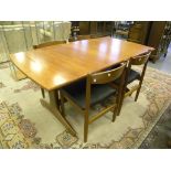 A 1970S TEAK AND LAMINATED DINING SUITE OF EXTENDING TABLE AND SET OF FOUR CHAIRS