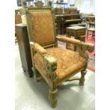 A 19TH CENTURY CARVED OAK ARMCHAIR