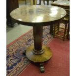 AN EARLY VICTORIAN MAHOGANY LAMP TABLE ON PLATFORM AND THREE WEDGE FEET